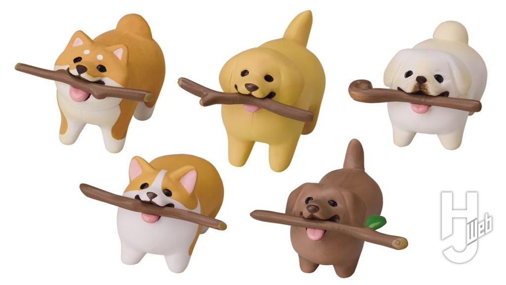 棒を咥える犬のカプセルフィギュアの画像