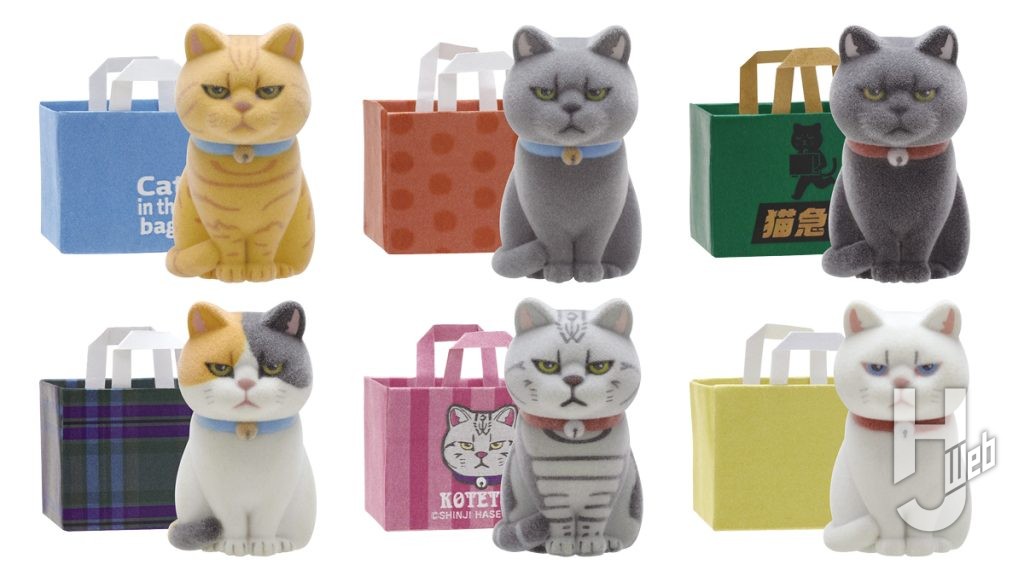 紙袋に入った猫のカプセルフィギュアの画像
