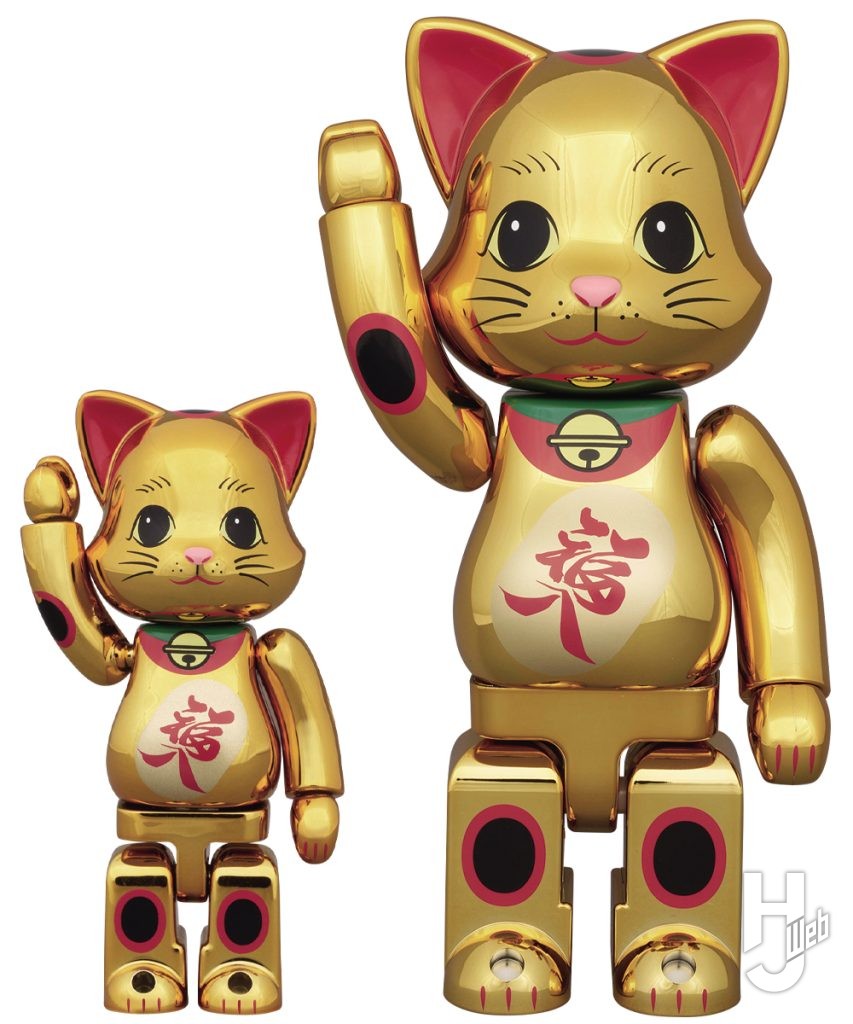  金メッキの招き猫のベアブリックの画像