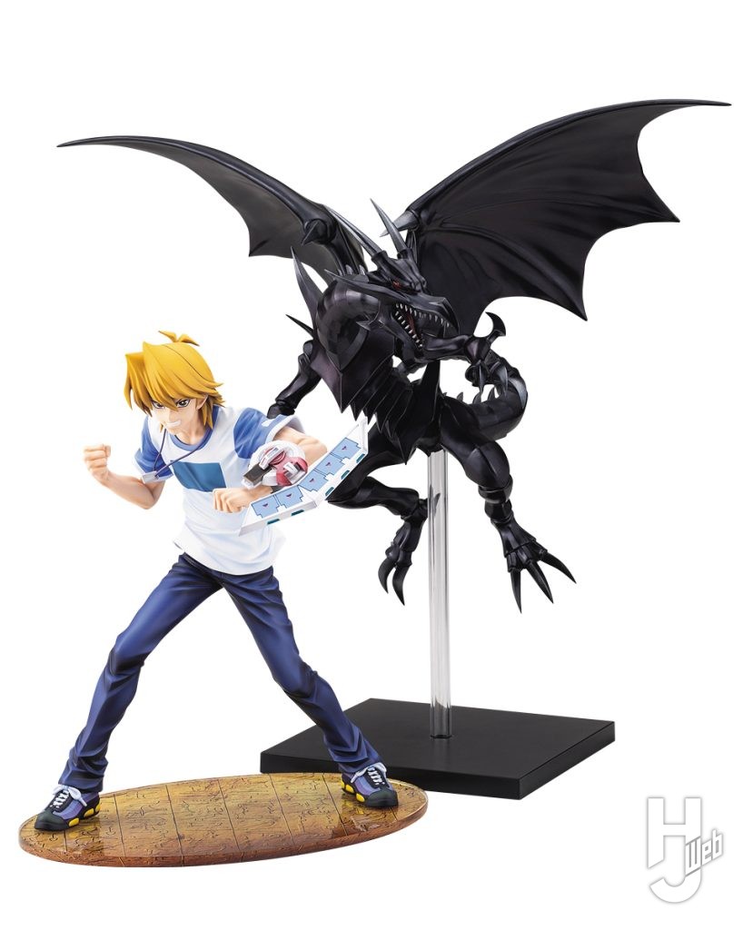 城之内克也のフィギュアと真紅眼の黒竜のフィギュアの画像